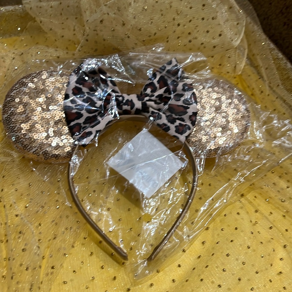 Disney ears with cheetah bow and gold ears, brand new